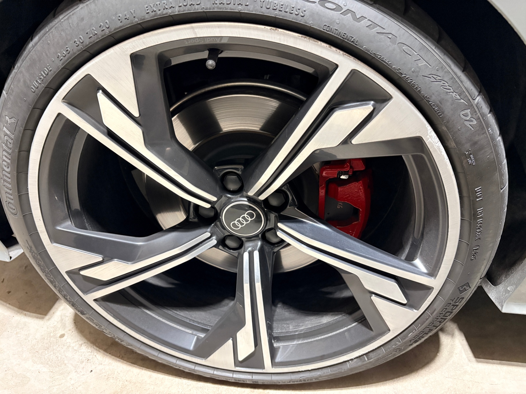 Audi Sport wheel with curb damage on the polished outer lip